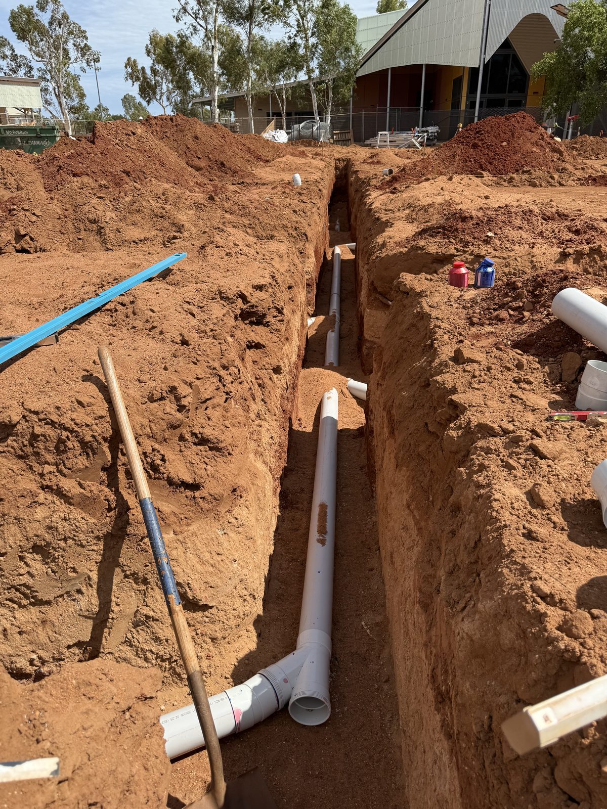 Sewer main bedded and prepared for backfill
